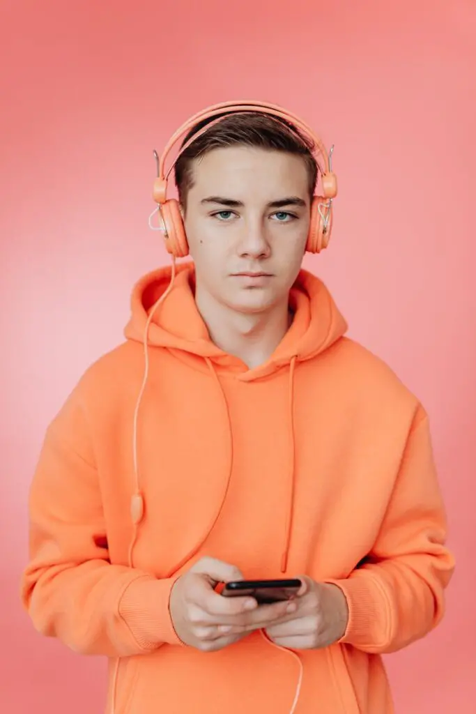 man in hoodie and with headphones
