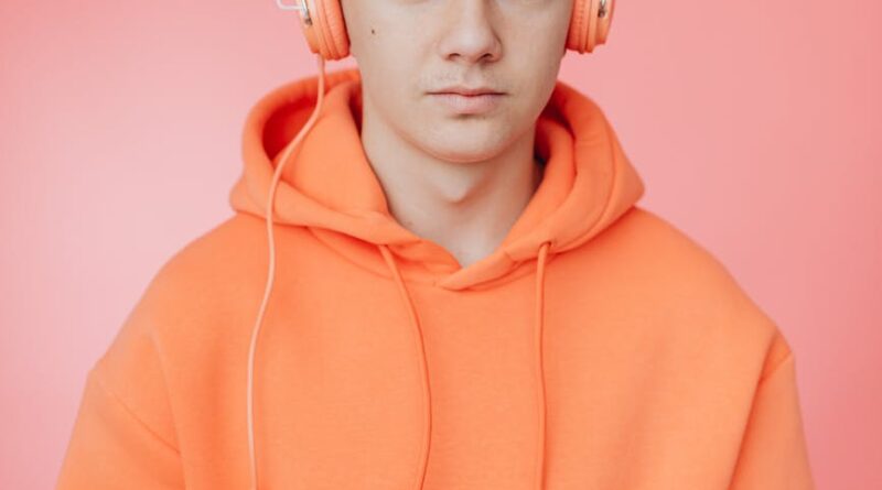man in hoodie and with headphones