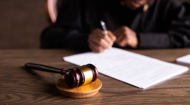 judge signing on the papers